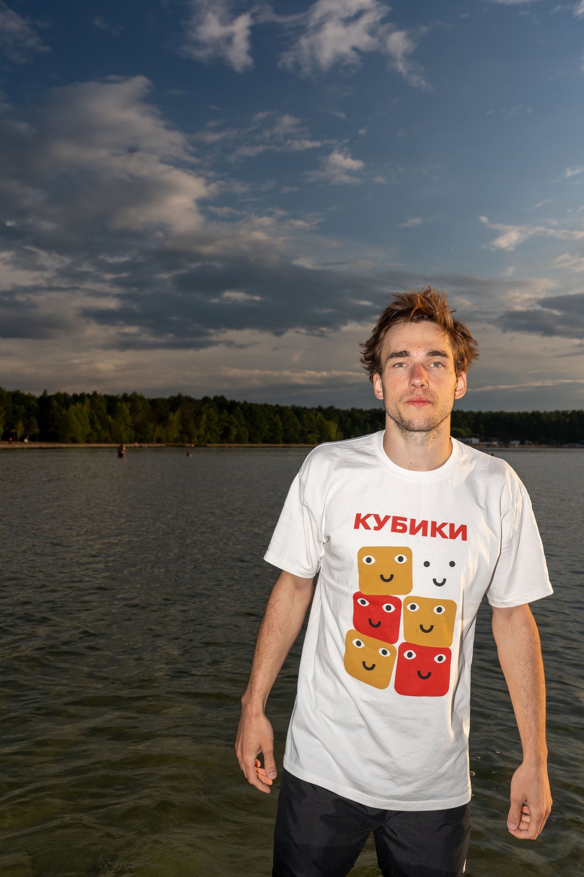 Man wearing the Banka T-shirt with its toy-block print